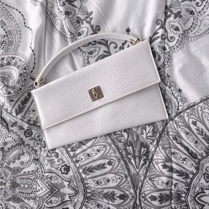 Asymmetric top handle purse